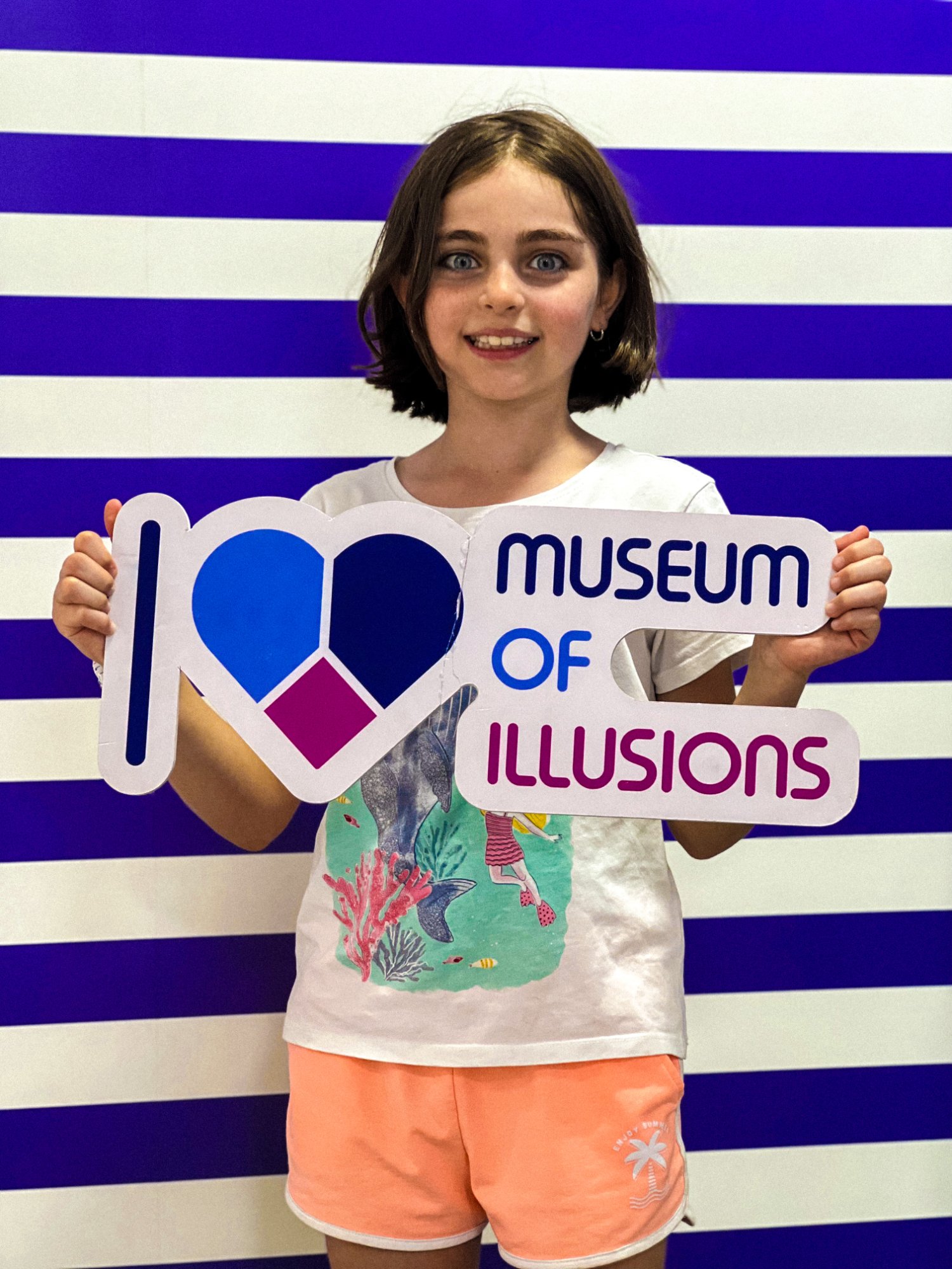 Girl with MOI sign
